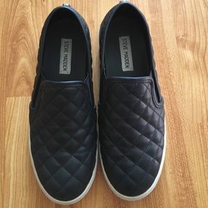 Steve Madden slip ons.