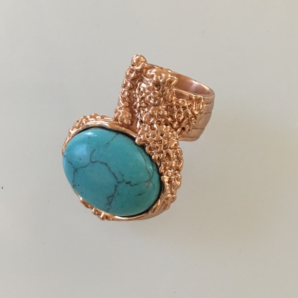 Gold plated ring with turquoise stone