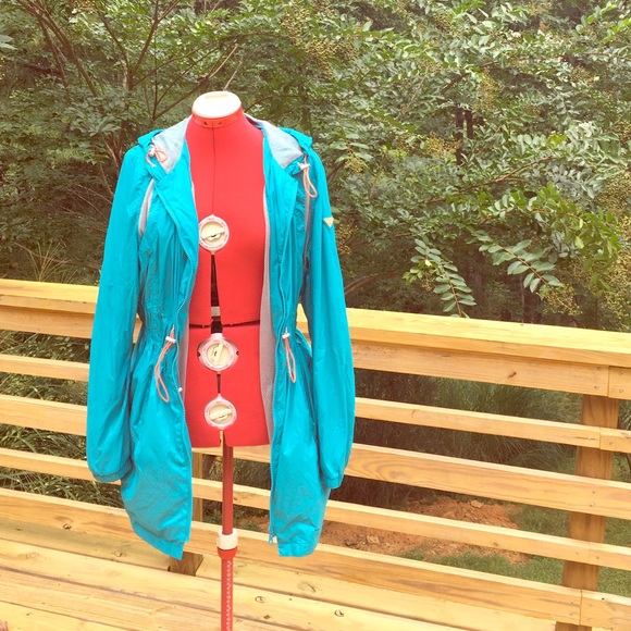 Turquoise wind breaker