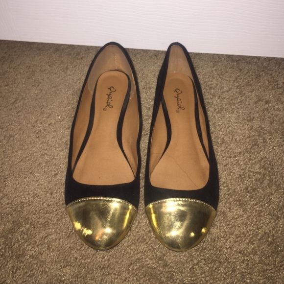 Black and gold flats