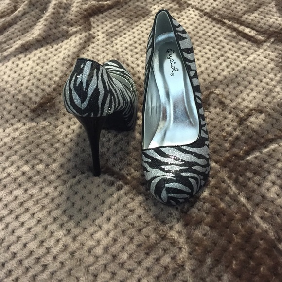 Black and silver pumps