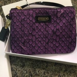 Purple authentic Coach wristlet