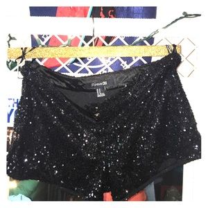 Black, sequined shorts.