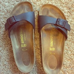 One-strap black Birkenstock sandals
