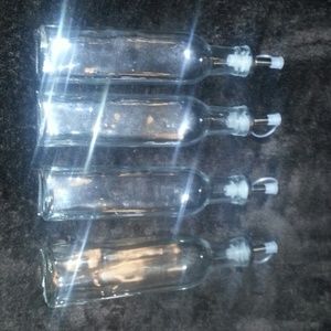 4 brand new oil or vinegar glass decanters