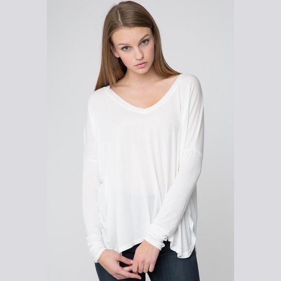 white flowy long sleeve shirt