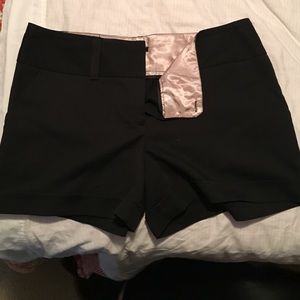Maurice's black shorts!