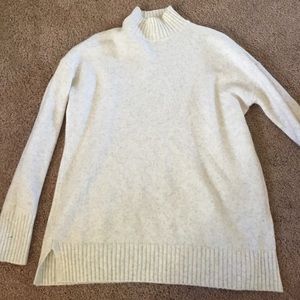 White turtleneck sweater