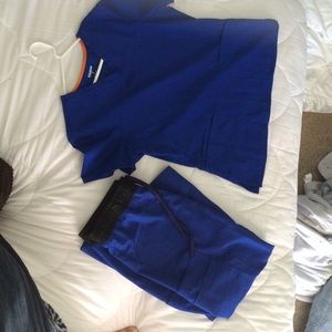 Blue nurse scrub set: blue shirt & pant.