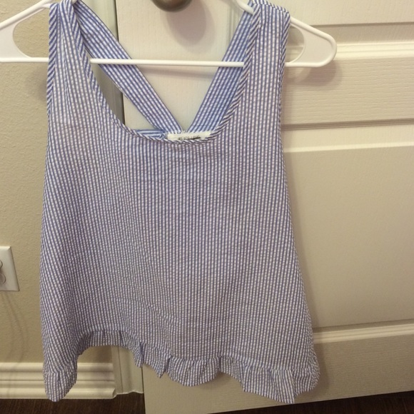 adorable blue and white blouse with bow on back