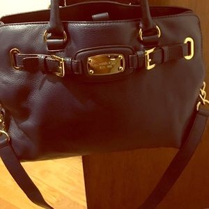 Navy MK bag with gold hardware.