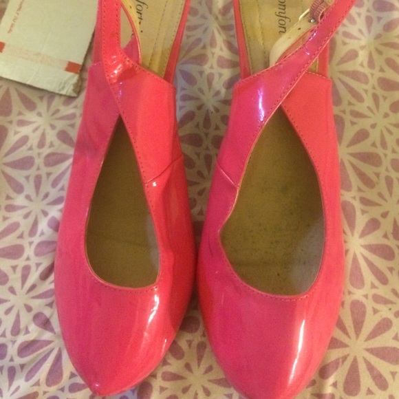 Hot pink patent leather pumps