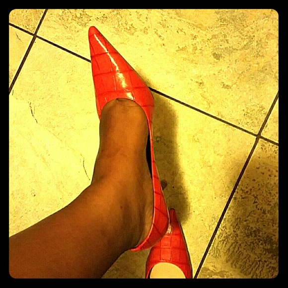 Orange pair of pumps