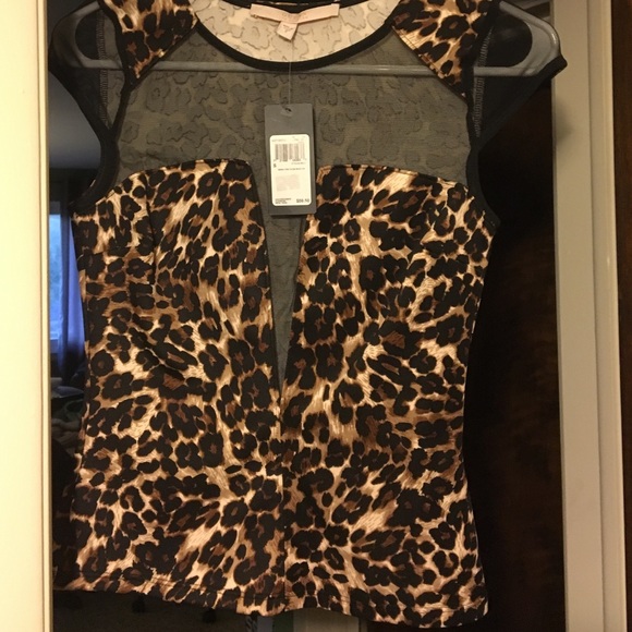 Guess Animal print dress top.