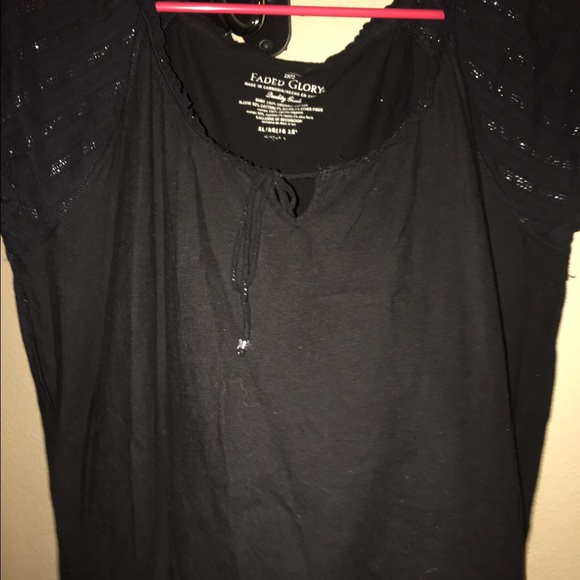 This is a very black blouse, the lighting off on 1