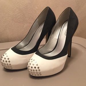 Like New.. black and white suede heels