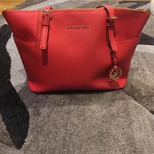 Michael Kors Orange Jet Set Safiano bag