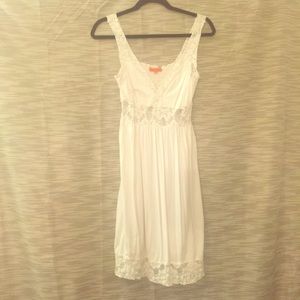 white fabric v neck dress