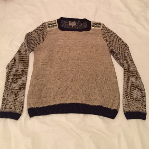 Long sleeve knit sweater with studded shoulders