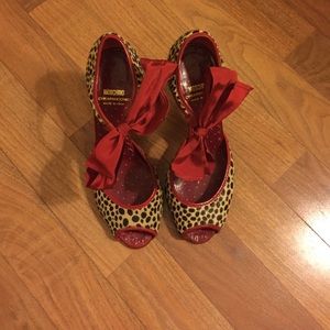 Moschino pony hair peep toe ankle tie heels.