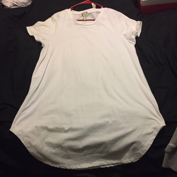 Long white sort of fitting dress