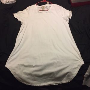 Long white sort of fitting dress