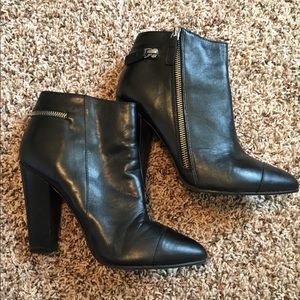 Black leather booties w/ zipper details from Aldo