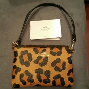 Leopard coach wristlet