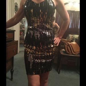 Black and gold sequined dress