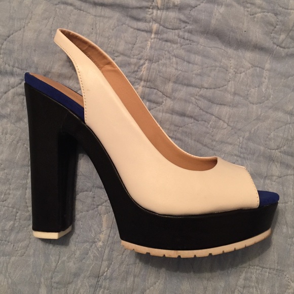 Black/white platform heels with blue trim. - Picture 1 of 4