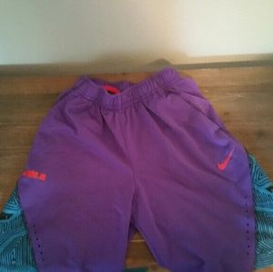 Girls Nike Elite Shorts 3 pair. 2 black, 1 purple.
