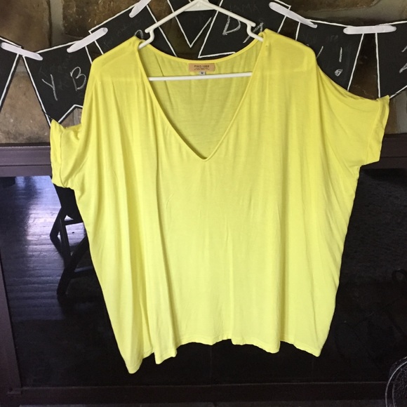 Piko's bright, summery yellow t-shirt or blouse.