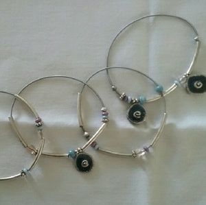 Silvertone Boho rubber bracelets