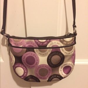 Purple and brown coach cross body fabric bag