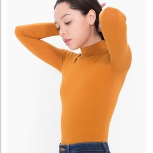 Cotton spandex turtleneck top.