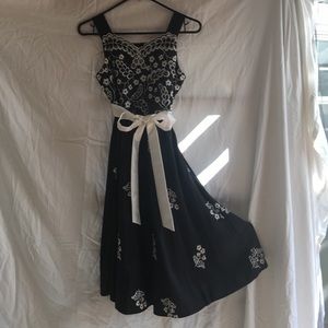 Black dress with embroiderer white flowers