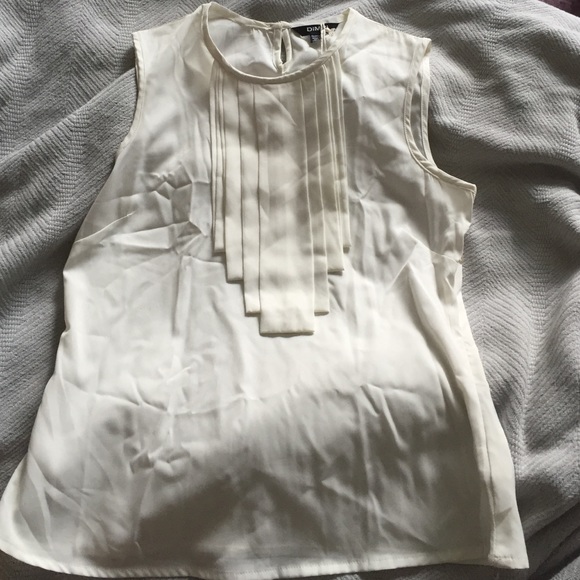 Sleeveless white blouse