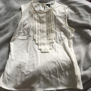 Sleeveless white blouse