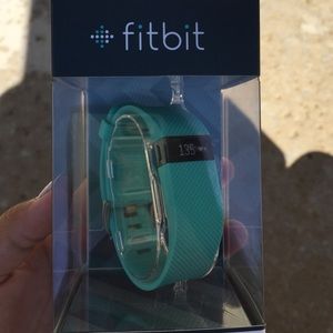 Brand new never opened Fit Bit charge Hr TEAL