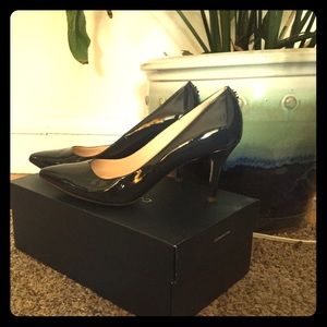Cole Haan navy pumps