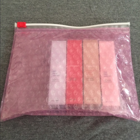 Brand new set of flavored Glossier skin salves