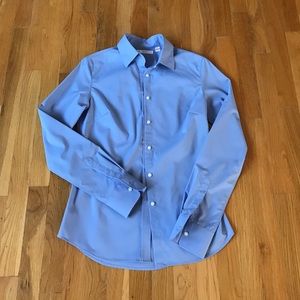 Women's blue button down shirt