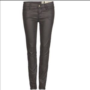 Dark brown waxed coated skinny jeans. All saints