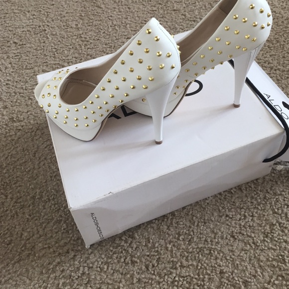 White ALDO peep toe pumps