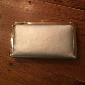 Silver and gold clutch