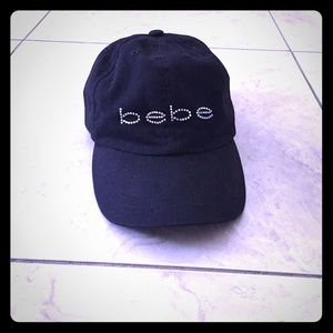 Bebe hat in black.