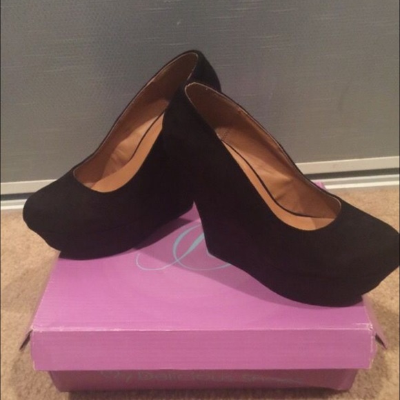 Black suede wedge heels