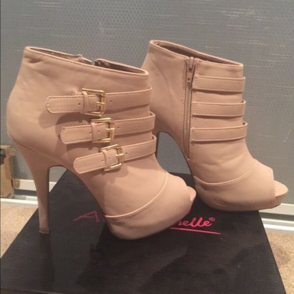 Cream colored buckle heels