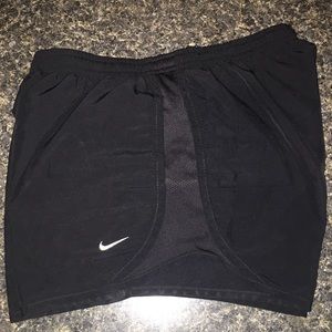Black Nike running shorts