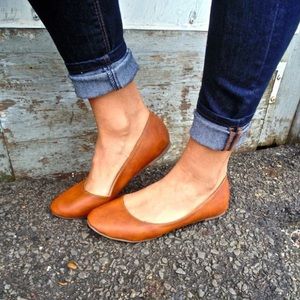 Tan ballet flats